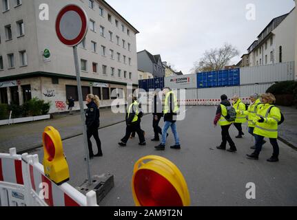 Dortmund, Germany. 12th Jan, 2020. Containers are placed in a street in the city centre as protection against a possible bomb explosion. Because of the suspicion of four aerial bombs from the Second World War thousands of people have to leave the danger zone. If the suspicions are confirmed, the bombs are to be defused today. Credit: Henning Kaiser/dpa/Alamy Live News Stock Photo