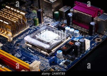 The icy central processor on the motherboard. The concept of cooling. Stock Photo