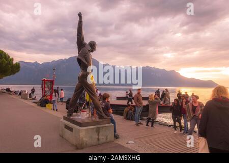 Montreux, Switzerland - October 12, 2019: View of the statue of Freddy Mercury and tourists Stock Photo