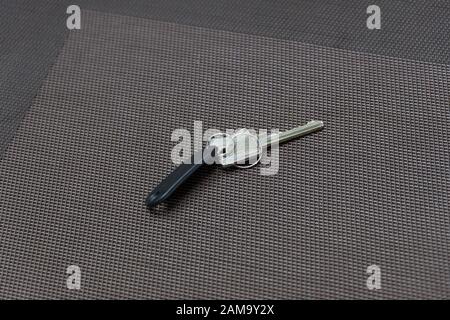 The key with a tag from the hotel room on the table Stock Photo