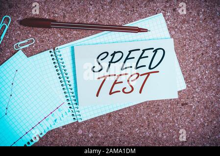 Handwriting text Speed Test. Conceptual photo psychological test for the maximum speed of performing a task Desk notebook paper office cardboard paper Stock Photo