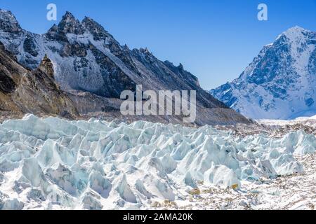 Seracs on The Khumbu Glacier in the Nepal Himalayas, often visited as part of the Everest Base Camp Trek Stock Photo