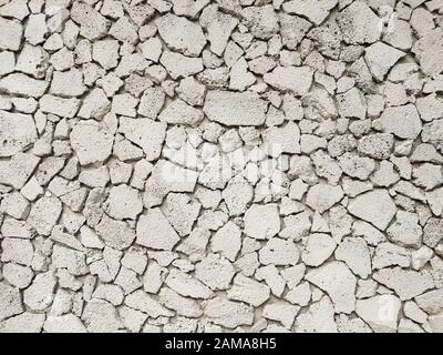 Texture of concrete in grey tone with cracked surface and dirt in cracks.old gray concrete wall for background. Concrete texture in white tone with ve Stock Photo