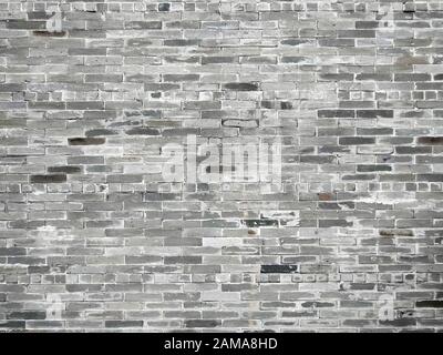 Vintage  wash brick wall texture for design. Panoramic background for your text or image.Grey brick wall texture background. Tiled. Stock Photo