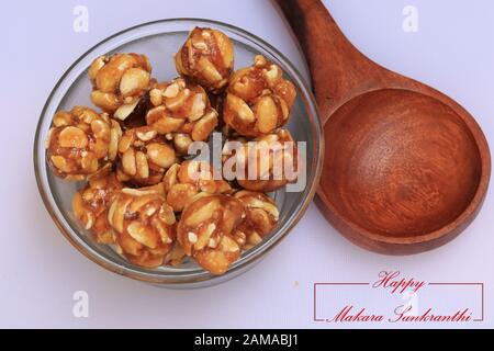 Til Gul OR Sweet Sesame Laddu for Indian festival Makar Sankranti over white background Stock Photo