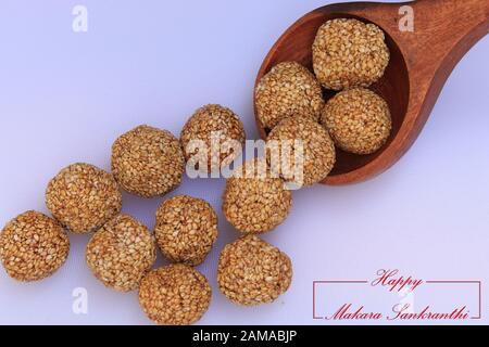 Til Gul OR Sweet Sesame Laddu for Indian festival Makar Sankranti over white background Stock Photo