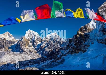 View of Himalayan mountains including Cholatse from the Renjo La pass on the Three Passes Trek in the Nepal Himalayas Stock Photo