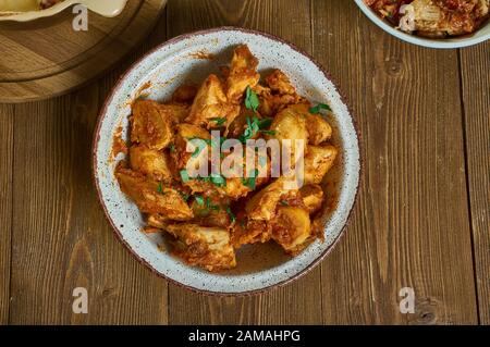 Kondres  - Spicy Stewed Plantains, popular Cameroonian one-pot meal with highly-seasoned spicy stewed plantains, meat and veggies Stock Photo
