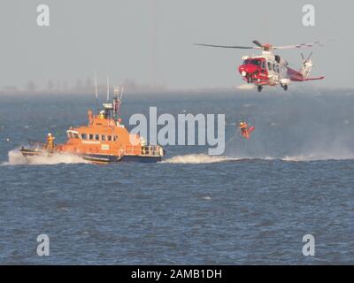 Sheerness, Kent, UK. 12th Jan, 2020. Sheerness All Weather Lifeboat 'George & Ivy Swanson' spent part of this afternoon training with the Coastguard Helicopter 163 in the Thames Estuary off Sheerness, Kent in a dramatic display involving the winchman landing onto the deck of the lifeboat at extremely close quarters. Credit: James Bell/Alamy Live News Stock Photo