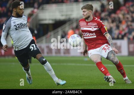 MIDDLESBROUGH, ENGLAND - JANUARY 11TH Middlesbrough's Hayden Coulson and Derby's Jayden Bogle in action during the Sky Bet Championship match between Middlesbrough and Derby County at the Riverside Stadium, Middlesbrough on Saturday 11th January 2020. (Credit: Tom Collins | MI News) Stock Photo