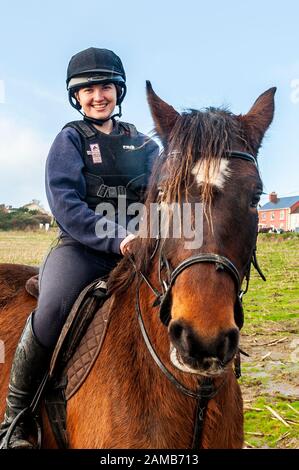 Butlerstown, West Cork, Ireland. 12th Jan, 2020. The annual Carberry Hunt Butlerstown Fun Ride took place today with hundreds of horses and riders taking part. Pictured before the ride is Helen Hegarty from Clonakilty riding Bella Credit: Andy Gibson/Alamy Live News Stock Photo