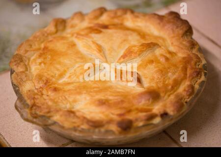A homemade turkey pie made from leftovers from a Christmas turkey dinner. Lancashire north west England UK GB. Stock Photo