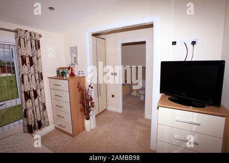 Luxury Interior Bedroom Of A Log Cabin Style Static Caravan Stock