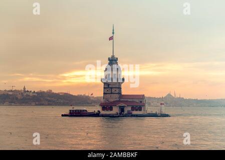 ISTANBUL - DEC 31: Evening in Istanbul, Maiden's Tower or Kiz Kulesi in Night Time in Istanbul on December 31. 2019 in Turkey Stock Photo