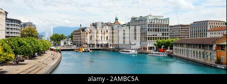 Panoramic view of the Rhone River with left the Quai Turrettini and right the Quai des Moulins. Geneva, Switzerland. Stock Photo