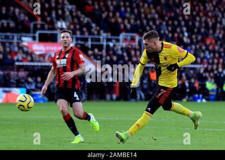 Bournemouth, UK. 12th Jan, 2020. Gerard Deulofeu of Watford (R) takes a shot at goal. Premier League match, AFC Bournemouth v Watford at the Vitality Stadium in Bournemouth, Dorset on Sunday 12th January 2020. this image may only be used for Editorial purposes. Editorial use only, license required for commercial use. No use in betting, games or a single club/league/player publications. pic by Steffan Bowen/ Credit: Andrew Orchard sports photography/Alamy Live News