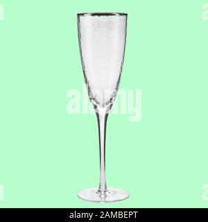 Empty wing glass on green background single with clipping path Stock Photo
