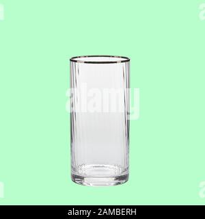 Empty wing glass on green background single with clipping path Stock Photo