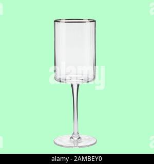 Empty wing glass on green background single with clipping path Stock Photo