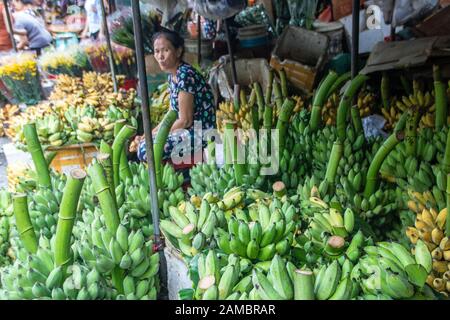 At Hue - Vietnam - On august 2019 - woman selling bananas at Dong Ba Market,  the oldest market in Hue City Stock Photo