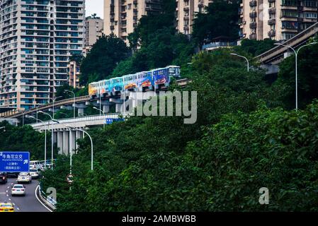 Chongqing, China - July 23, 2019: Multilayer roads and traffic by the Yangtze river in Chongqing, China Stock Photo