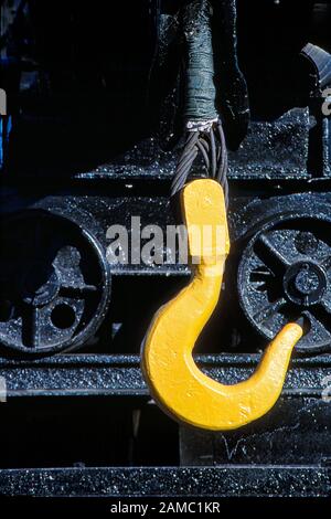 A railroad crane hook is a type of crane used on a railroad Stock Photo