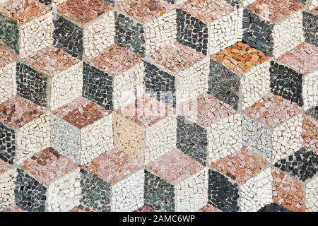 Geometric mosaic made from stone. Antique pattern. Stock Photo