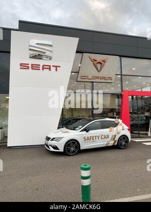 Paris, France - Oct 25, 2019: Front view of new luxury sport Seat Cupra car in front of new dealership car dealer showroom Seat Cupra safety car powered by Cupra Stock Photo