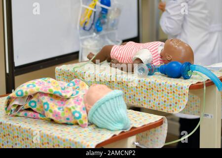 Realistic infant traning simulators for CPR education.  Children Hospital. Guayaquil.  Ecuador Stock Photo