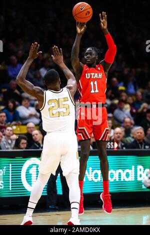 January 12, 2020: Utah Utes guard Both Gach (11) shoots a three over Colorado Buffaloes guard McKinley Wright IV (25) in the men's basketball game between Colorado and Utah at the Coors Events Center in Boulder, CO. Colorado raced out to a 26-7 lead in the first half. Derek Regensburger/CSM. Stock Photo