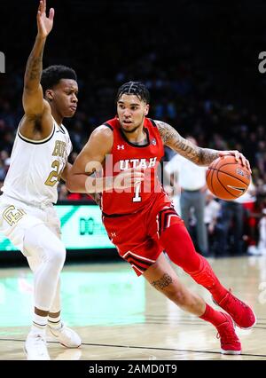 January 12, 2020: Utah Utes forward Timmy Allen (1) drives against Colorado Buffaloes guard Eli Parquet (24) in the men's basketball game between Colorado and Utah at the Coors Events Center in Boulder, CO. Colorado raced out to a 26-7 lead in the first half. Derek Regensburger/CSM. Stock Photo