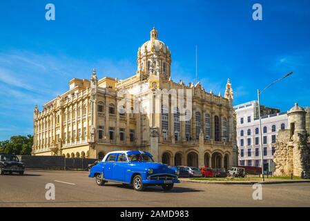 street view of havana with vintage car in cuba Stock Photo