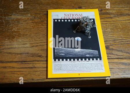 National Geographic Magazine and a model of the Apollo 11 moon lander Stock Photo