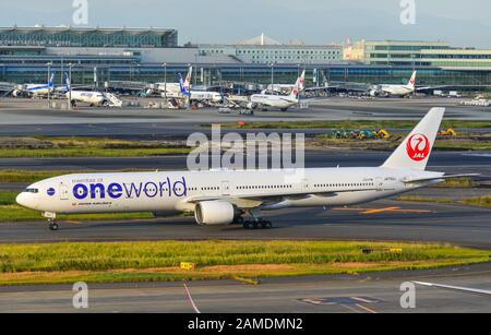 Tokyo, Japan - Nov 2, 2019. JA752J Japan Airlines Boeing 777-300 (Oneworld Livery) taxiing on runway of Tokyo Haneda Airport (HND). Stock Photo
