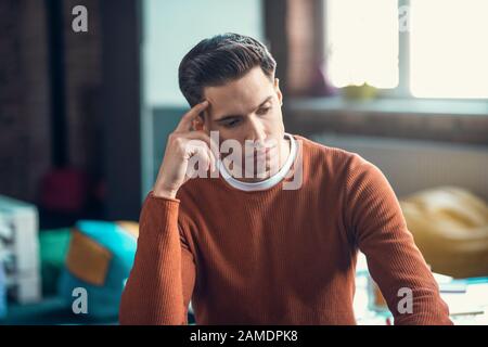Freelancer feeling overloaded while having too much tasks and deadline Stock Photo