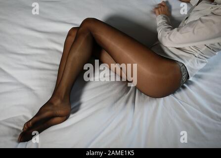 Legs covered from a pair of black pantyhose Stock Photo