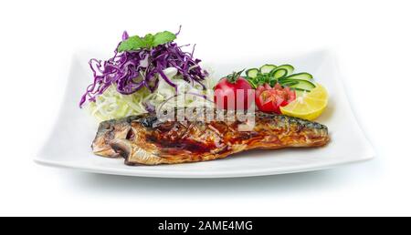 Saba Fish Grilled Teriyaki Sauce Japanese food style  decorate with carved Tomato ,cucumber and Cabbage Slice Good Tasty for Healthy front view Stock Photo