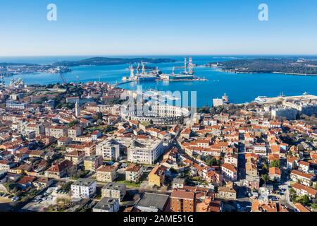an aerial view of Pula with amphitheatre and port, Istria, Croatia Stock Photo