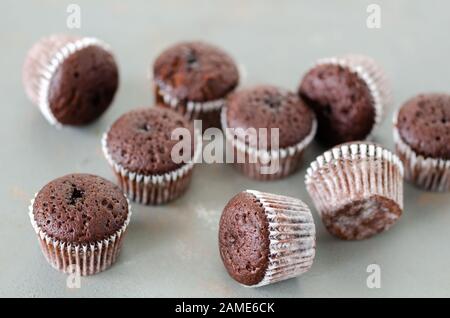 Homemade cupcakes isolated on gray background, close up Stock Photo