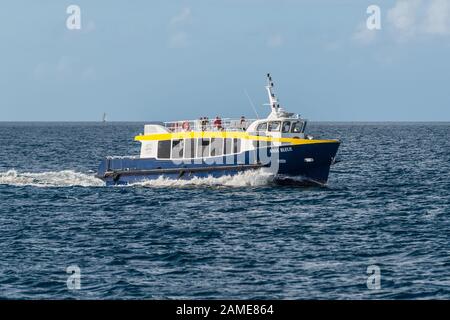 Fort-de-France, Martinique - December 13, 2018: Shuttle boat going to Fort de France, Martinique Island, West Indies. Stock Photo