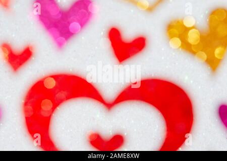 blurred background with colorful hearts. valentines day love concept card Stock Photo