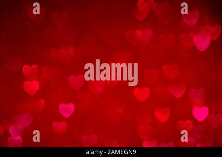 red valentines day background with hearts bokeh, love concept wallpaper Stock Photo