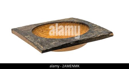 Hand-turned dark oak wooden bowl in square shape isolated on white Stock Photo