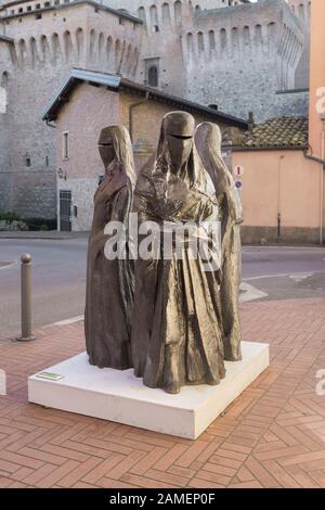 Oranti, sculpture representing a group of three muslim women wearing the burqa and niqab, Dario Brugioni, Vignola, Italy Stock Photo