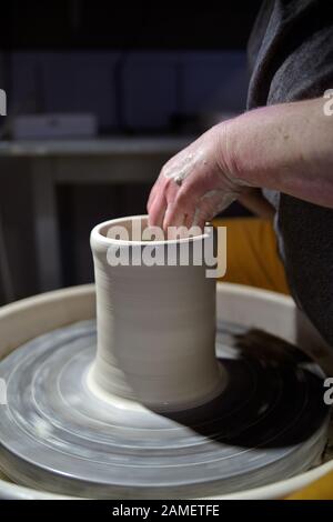 Working with pottery Stock Photo