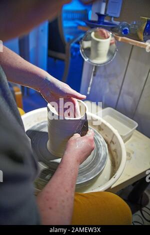 Working with pottery Stock Photo