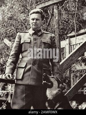 Marshal Josip Broz Tito, the leader of the united Yugoslav partisan armed forces against the Nazi invaders and their allies, poses with his dog. Stock Photo