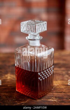 Elegant carafe filled with whiskey, bourbon or rum Stock Photo