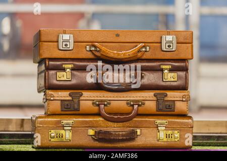 Pile of vintage brown leather suitcases Stock Photo