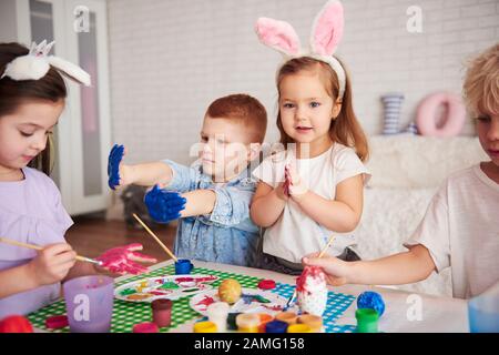Handmade easter eggs painted by group of children Stock Photo
